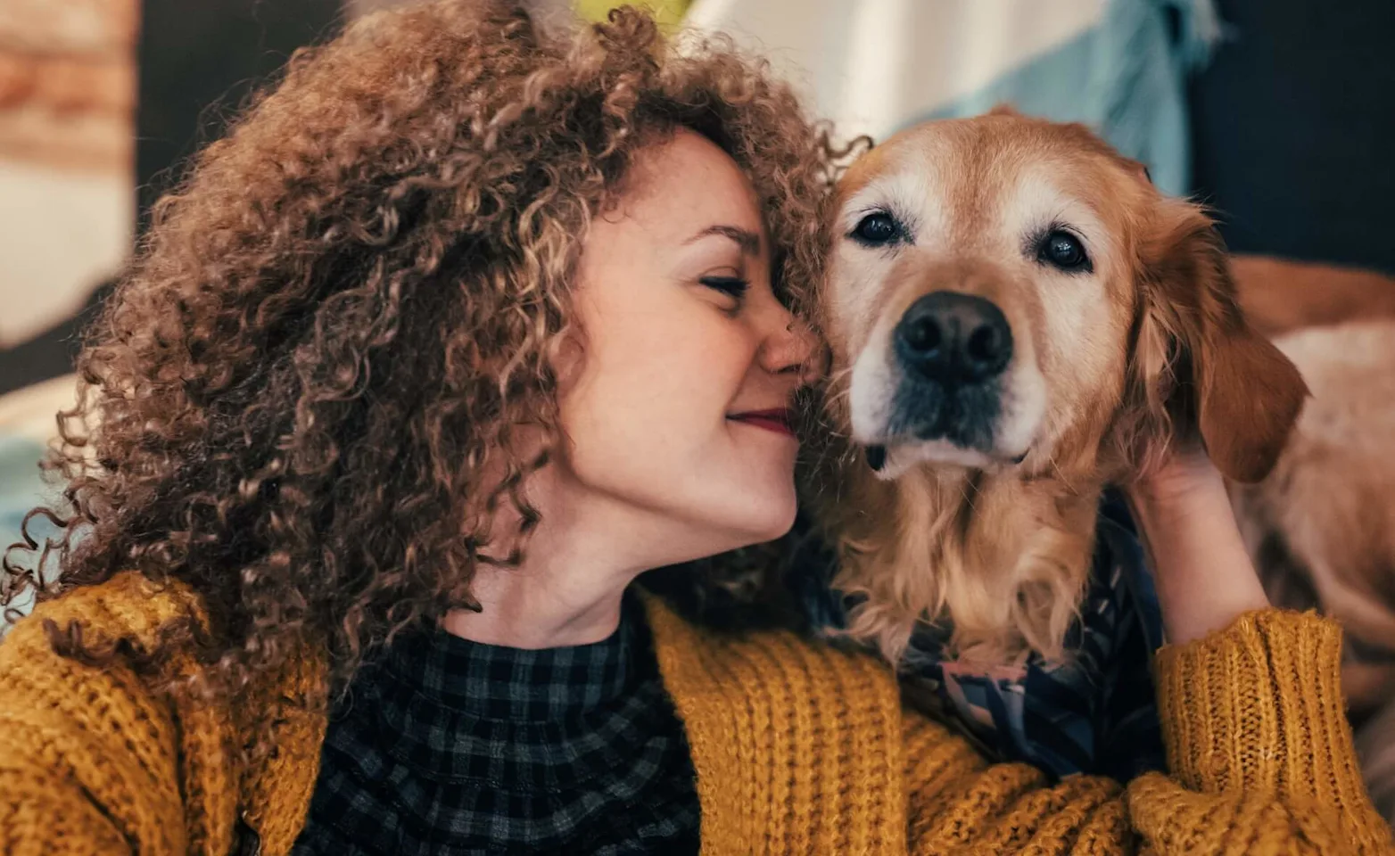 Woman smiling with golden retriever Woman smiling with golden retriever
