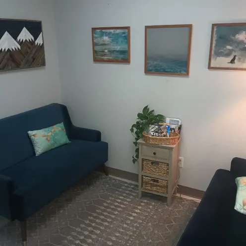 Updated waiting room with couches and pictures