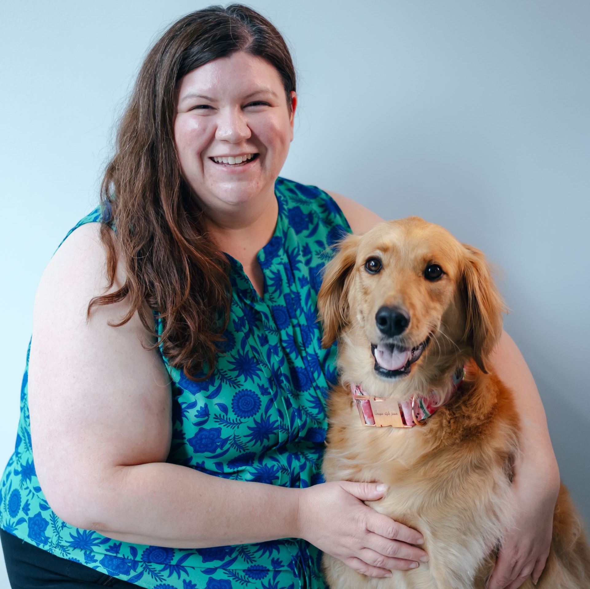 A veterinarian posing for a photo 
