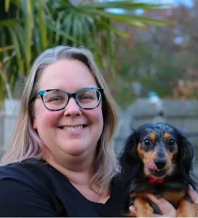 Laurie holding a pug Laurie holding a pug