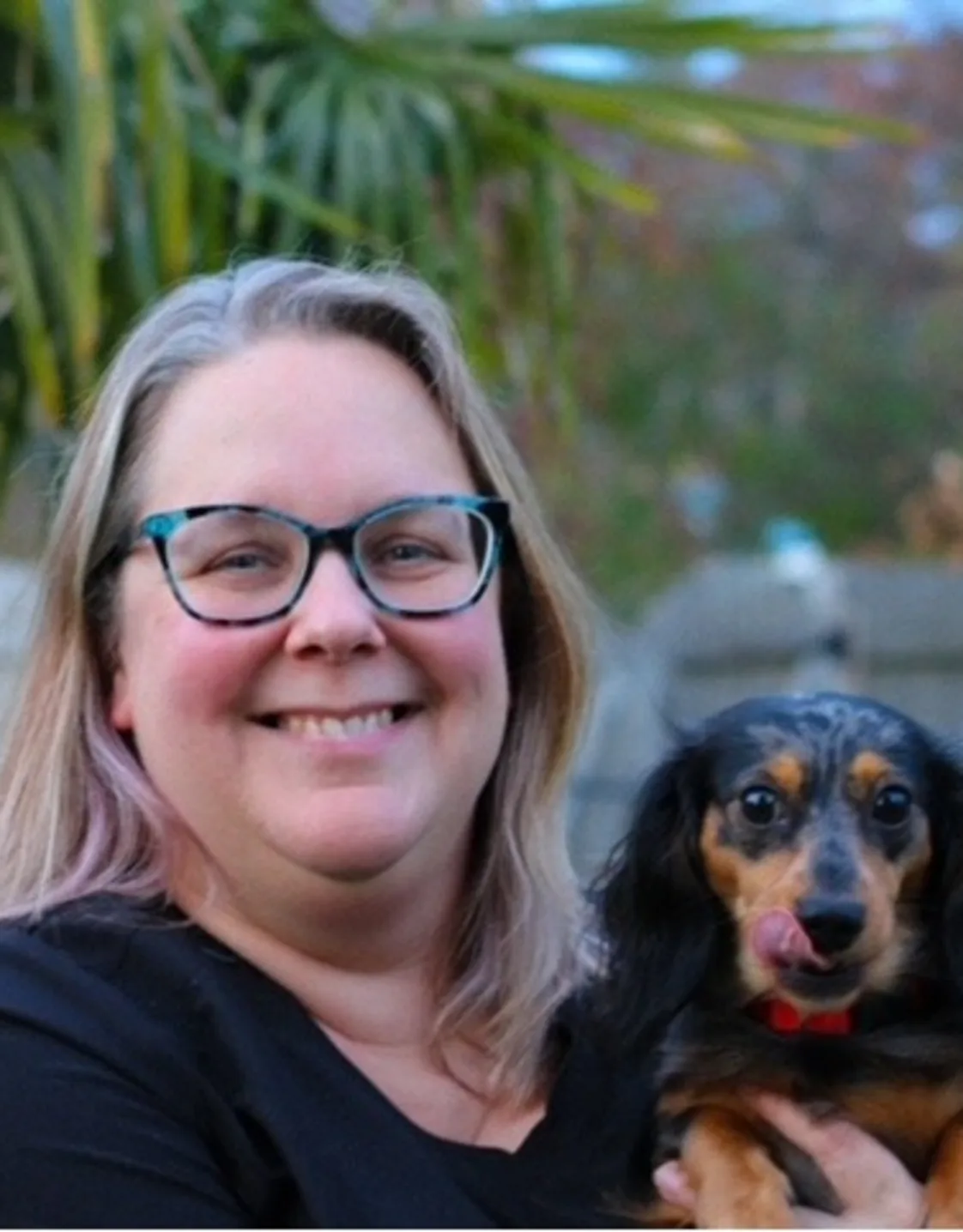 Laurie holding a pug Laurie holding a pug