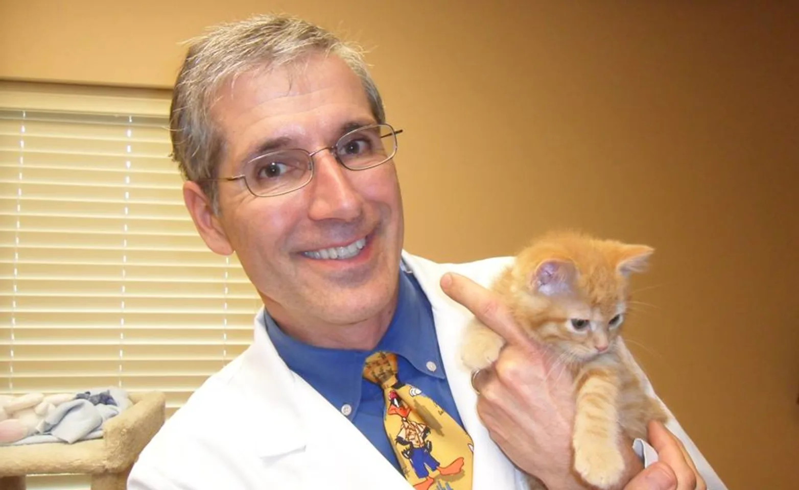Dr. Wasem holding a kitten