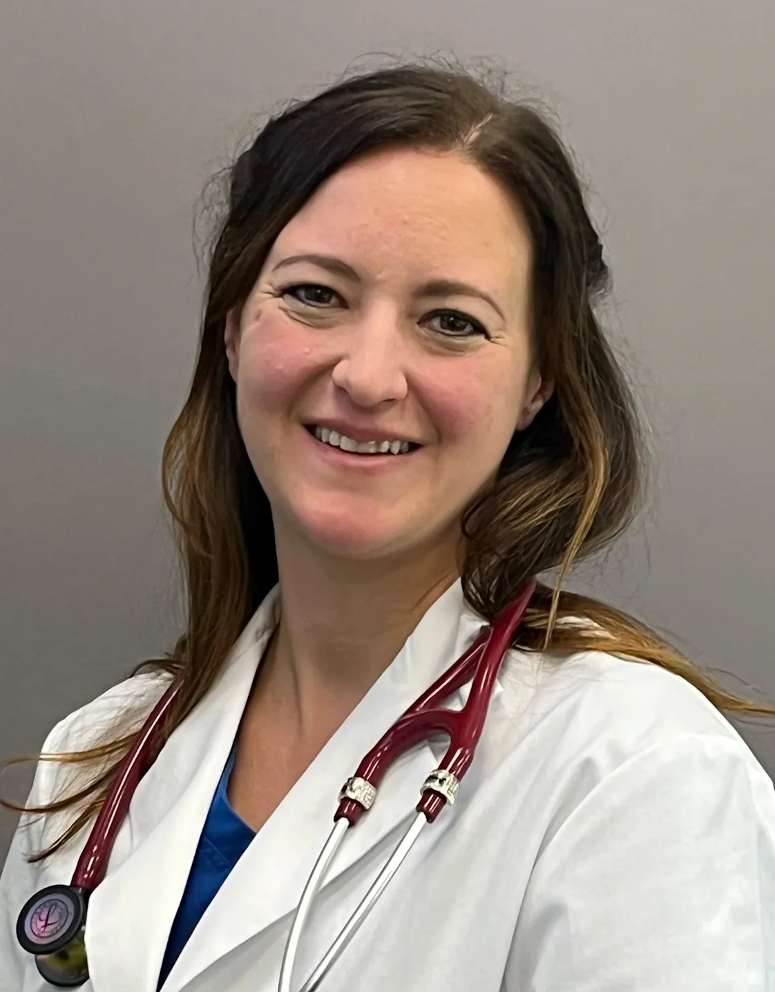 Rebekah Mayhew smiling for a photo. Rebekah Mayhew smiling for a photo.