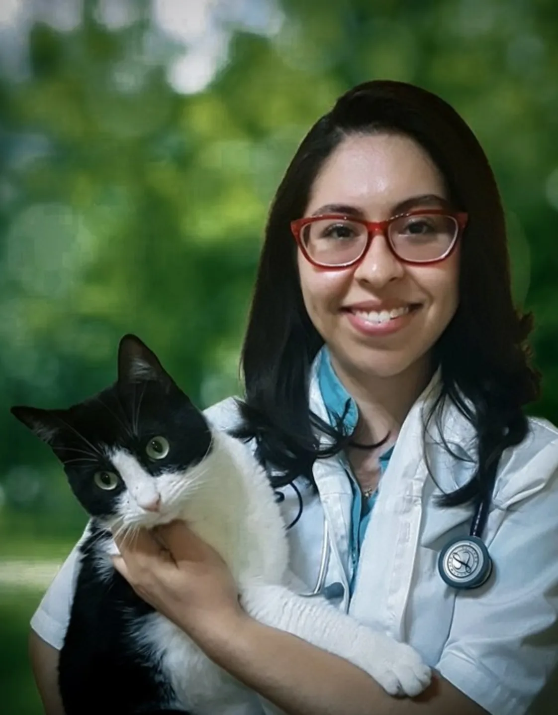 Dr. Susan Zamora holding a cat Dr. Susan Zamora holding a cat