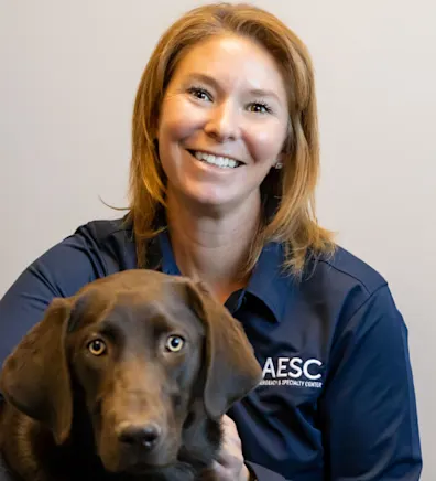 Headshot of Stephanie Claffey w/brown dog Headshot of Stephanie Claffey w/brown dog