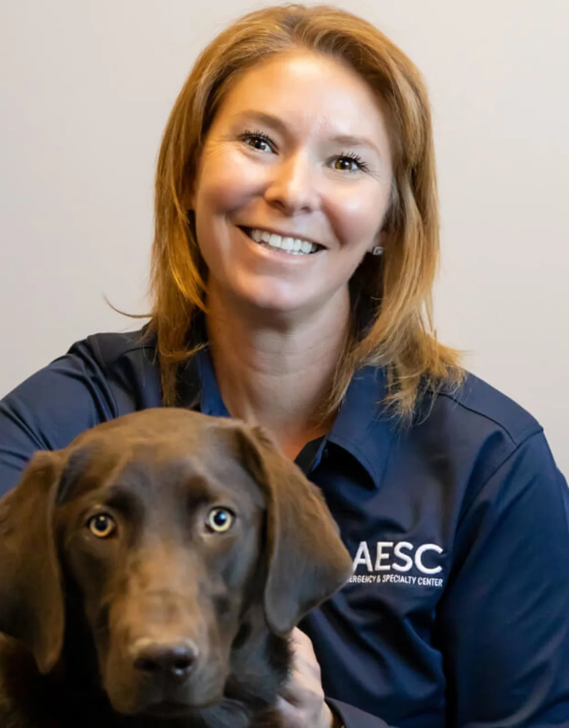 Headshot of Stephanie Claffey w/brown dog Headshot of Stephanie Claffey w/brown dog