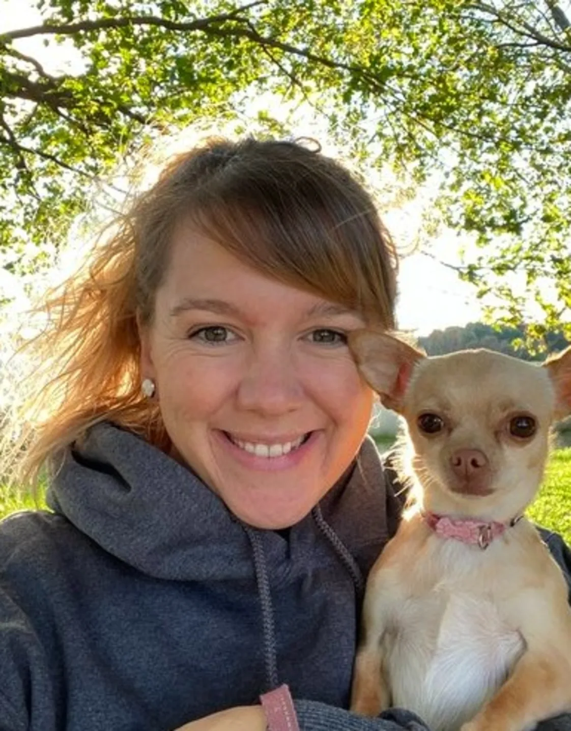 Brianna holding a small dog Brianna holding a small dog