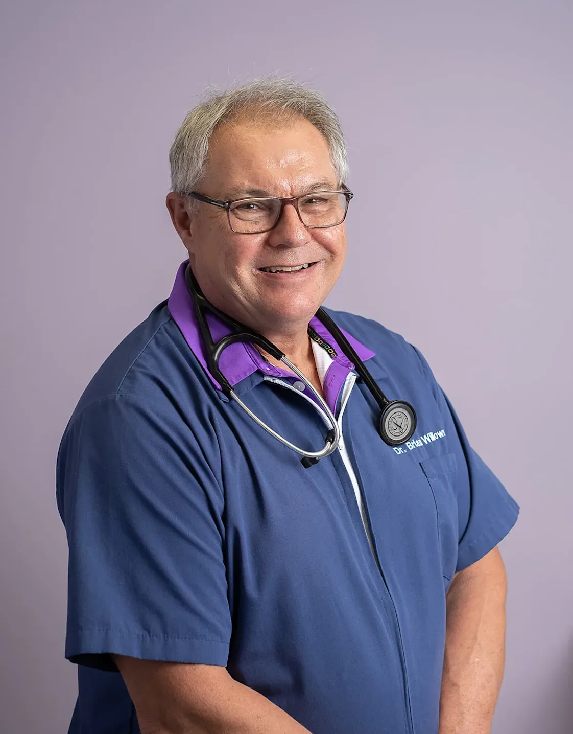 Dr. Brian Willows in front of a purple wall Dr. Brian Willows in front of a purple wall