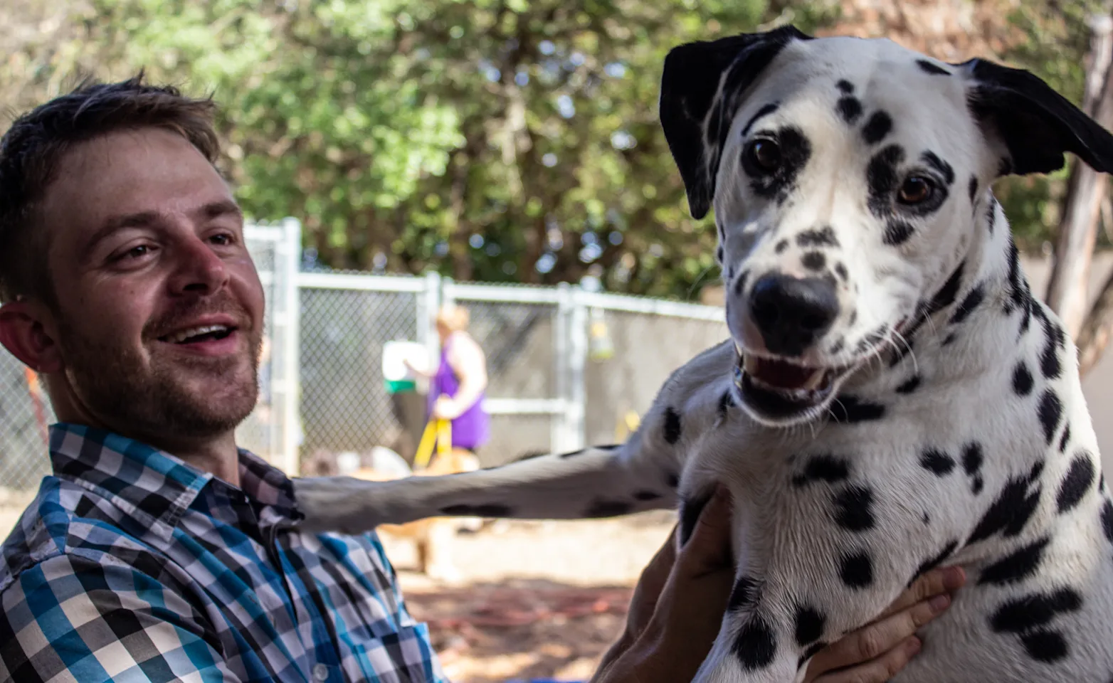 Staff member and dog Staff member and dog