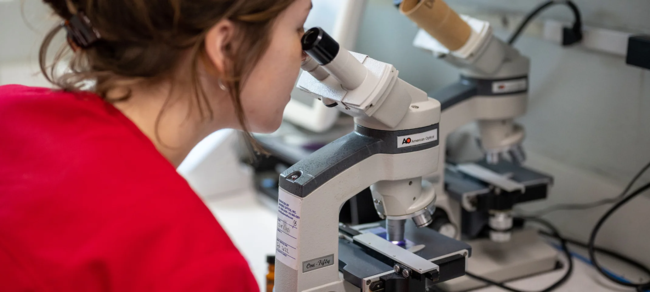 Technician with Microscope