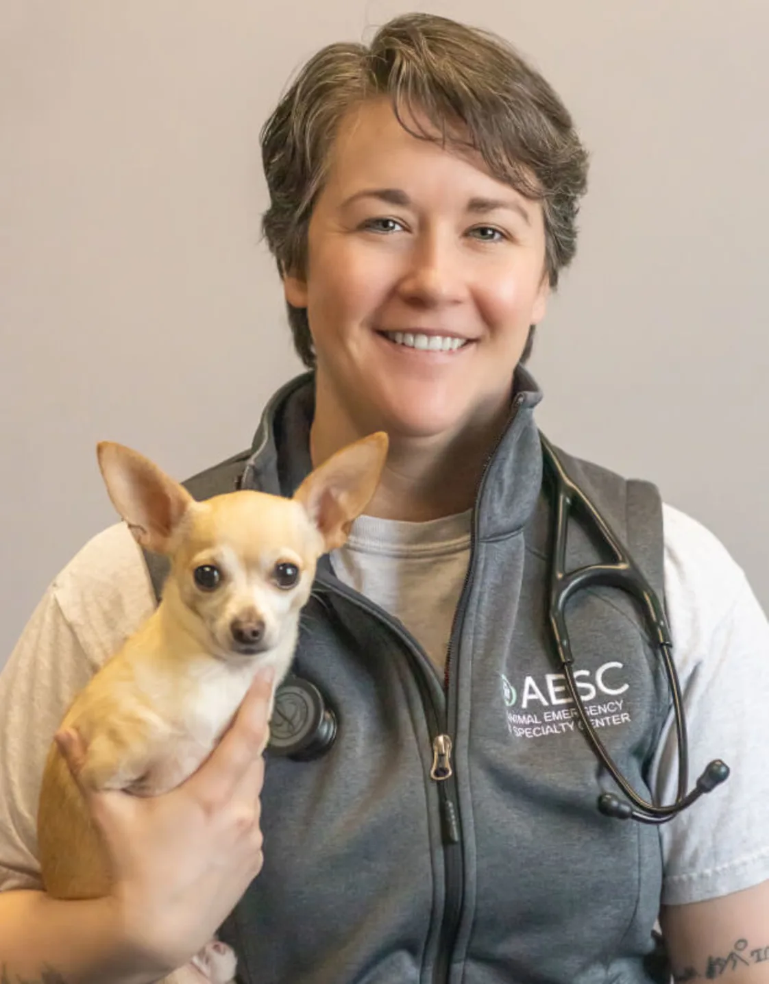 Headshot of Lindsey Weber w/brown chihuahua Headshot of Lindsey Weber w/brown chihuahua