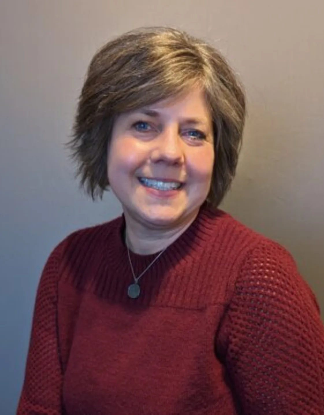 Martie Stevens smiling for a photo. Martie Stevens smiling for a photo.