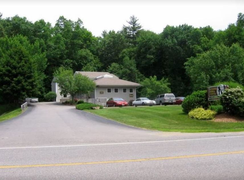 Raymond Animal Hospital's front building and driveway.