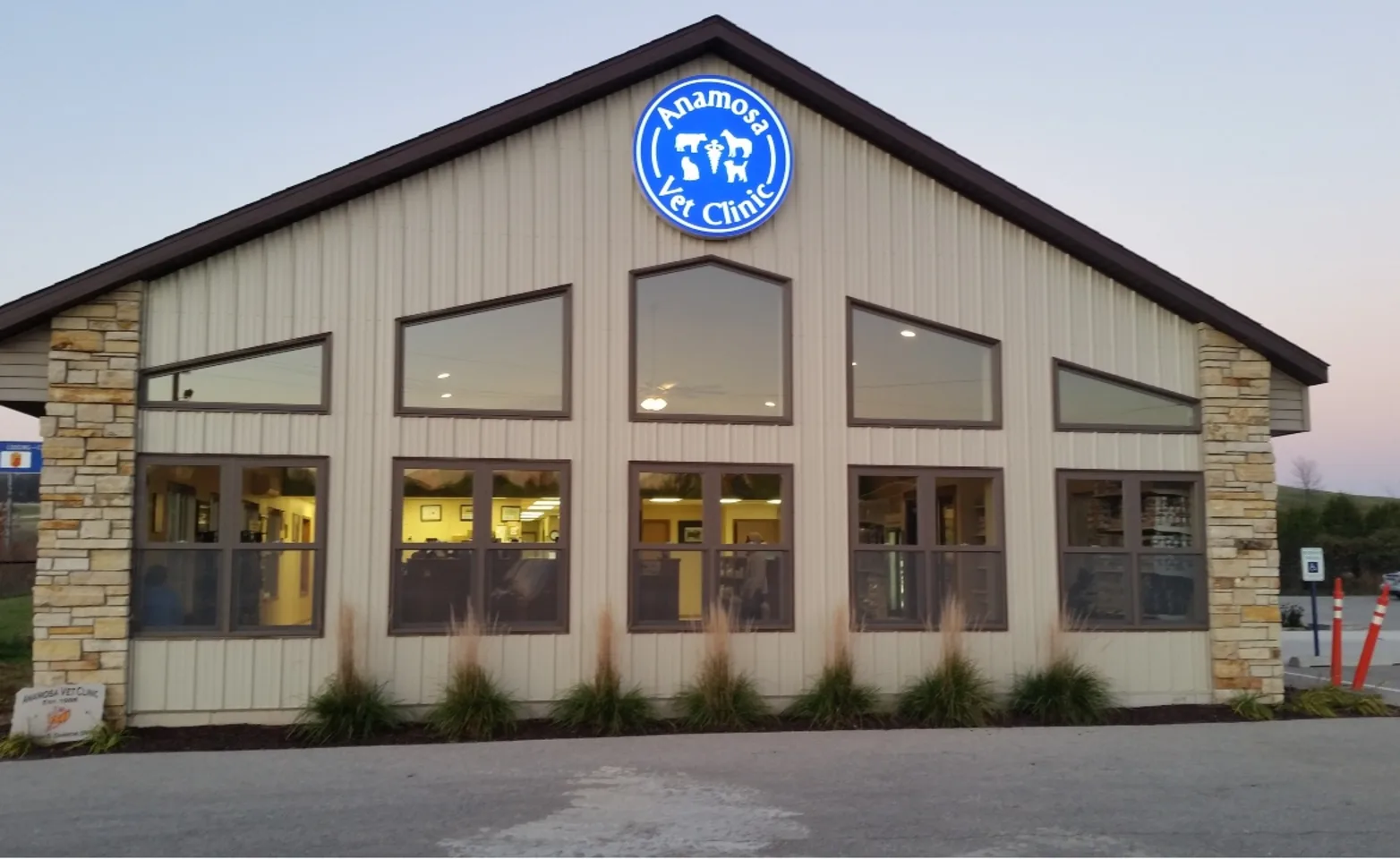 Anamosa Veterinary Clinic exterior of building at dusk Anamosa Veterinary Clinic exterior of building at dusk