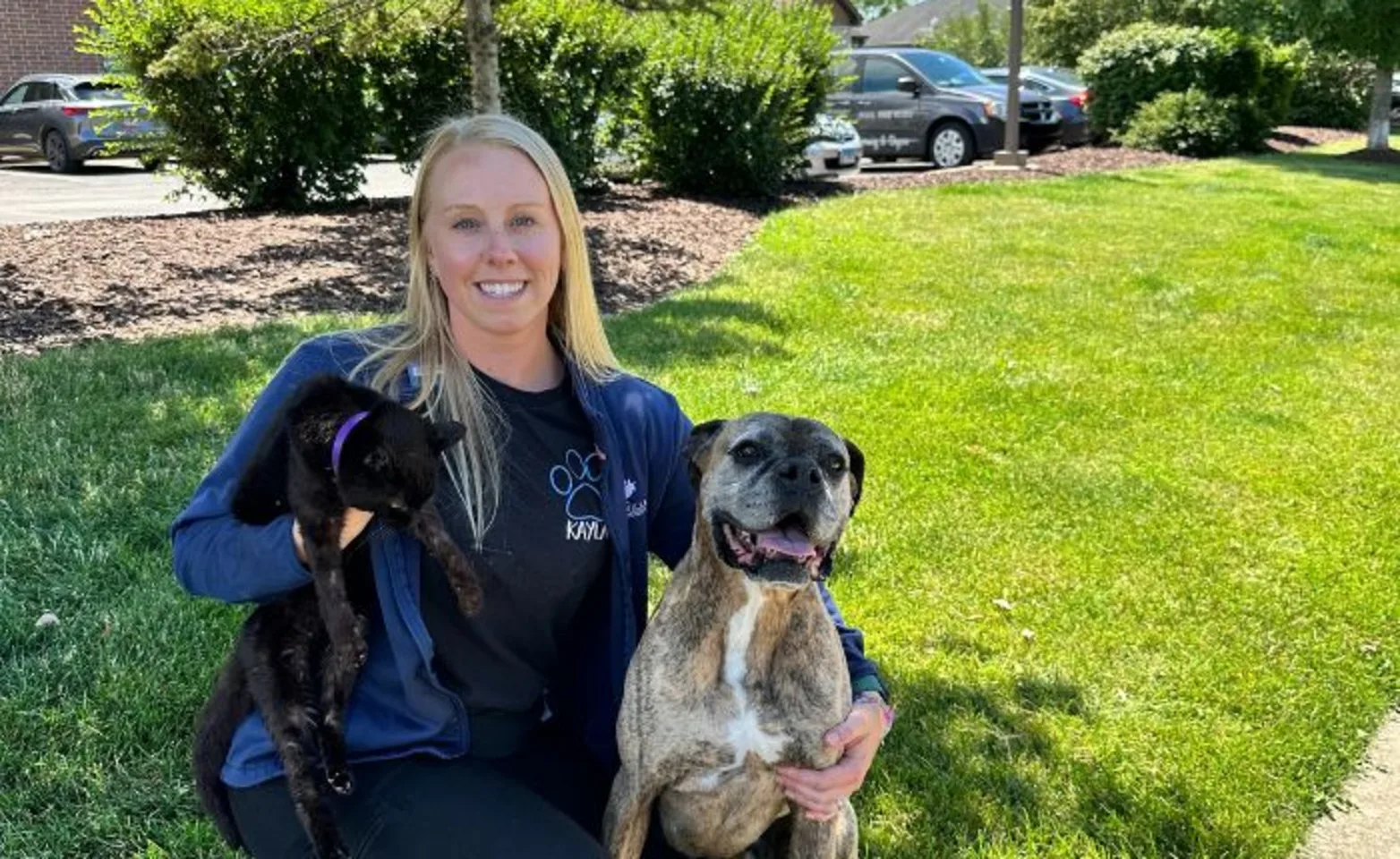 Yorkville Staff Member with a Cat & Dog Yorkville Staff Member with a Cat & Dog