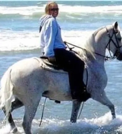 Katie riding a horse