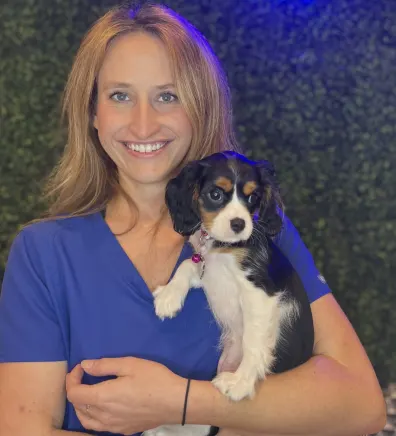 Karlee Holding a Dog Plushy Karlee Holding a Dog Plushy