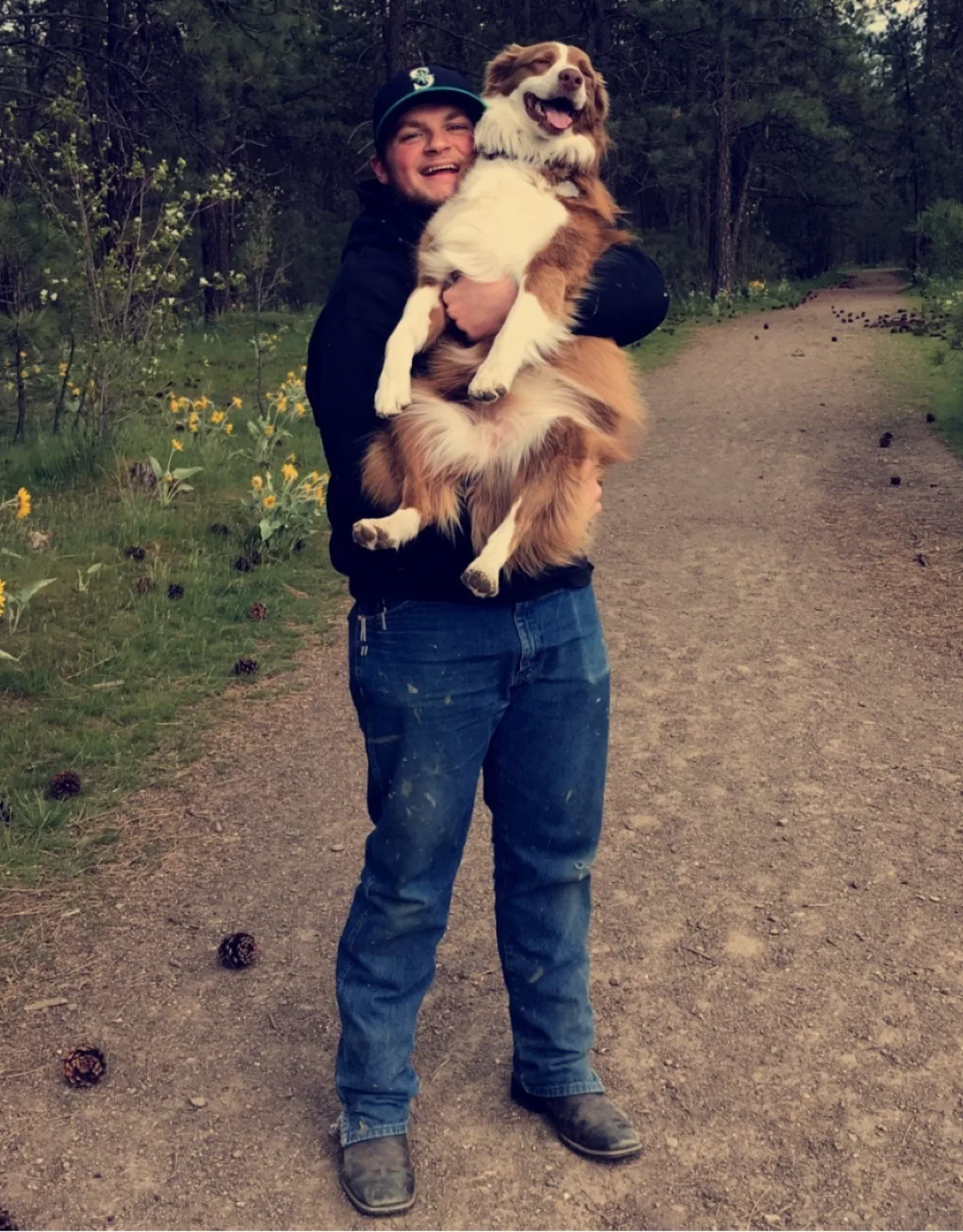 Zak Jones holding dog Zak Jones holding dog