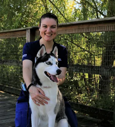 Jackie with a Husky on a bridge Jackie with a Husky on a bridge