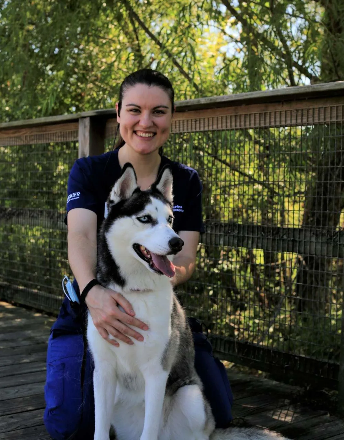 Jackie with a Husky on a bridge Jackie with a Husky on a bridge