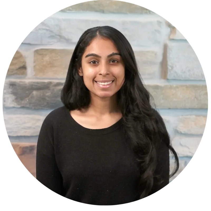 Dr. Anu Srinath smiling in headshot, wearing a blue blouse Dr. Anu Srinath smiling in headshot, wearing a blue blouse