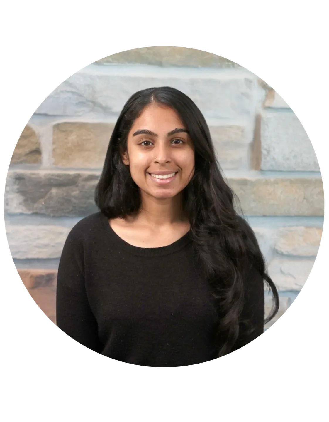 Dr. Anu Srinath smiling in headshot, wearing a blue blouse Dr. Anu Srinath smiling in headshot, wearing a blue blouse
