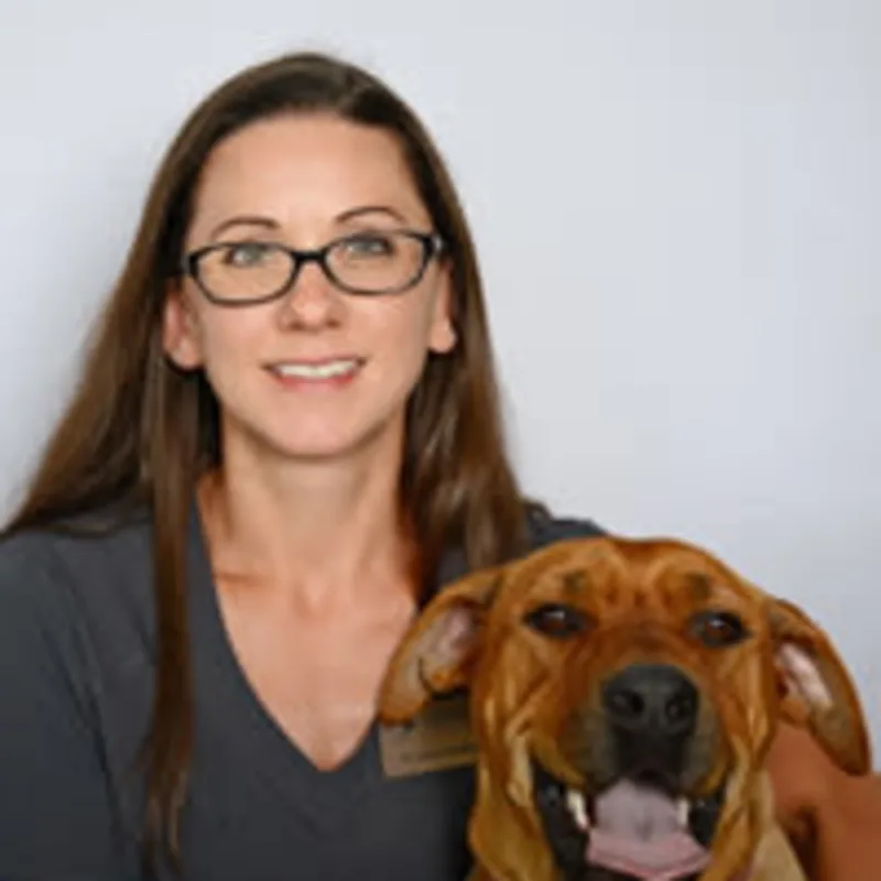 Dr. Andrist WITH A DOG Dr. Andrist WITH A DOG