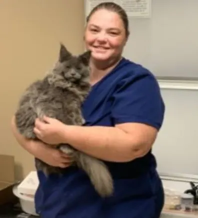 Amanda, CVT inside holding a cat Amanda, CVT inside holding a cat