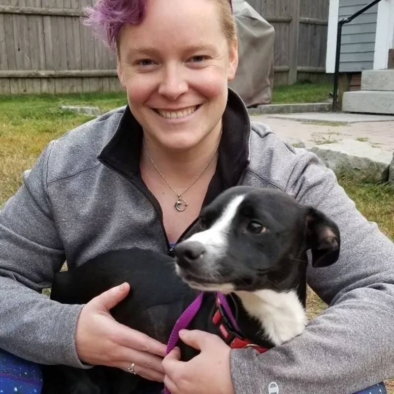 Dr. Sarah Henry with her dog. Dr. Sarah Henry with her dog.