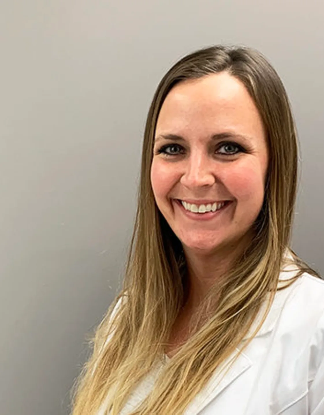 Libbey Schmitt smiling for a photo. Libbey Schmitt smiling for a photo.