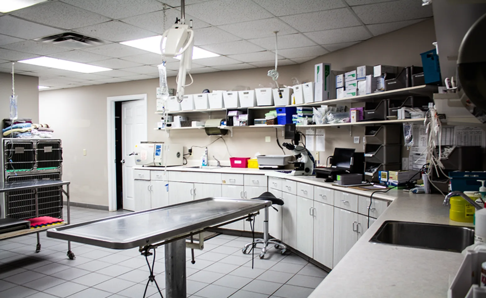 Treatment room with table and equipment Treatment room with table and equipment