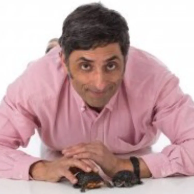 Dr. Albert Mughannam with two turtles Dr. Albert Mughannam with two turtles