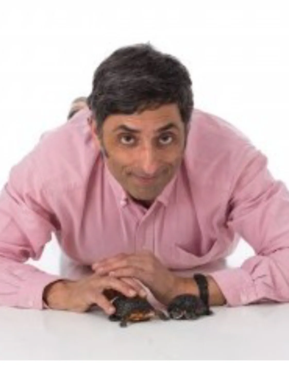 Dr. Albert Mughannam with two turtles Dr. Albert Mughannam with two turtles