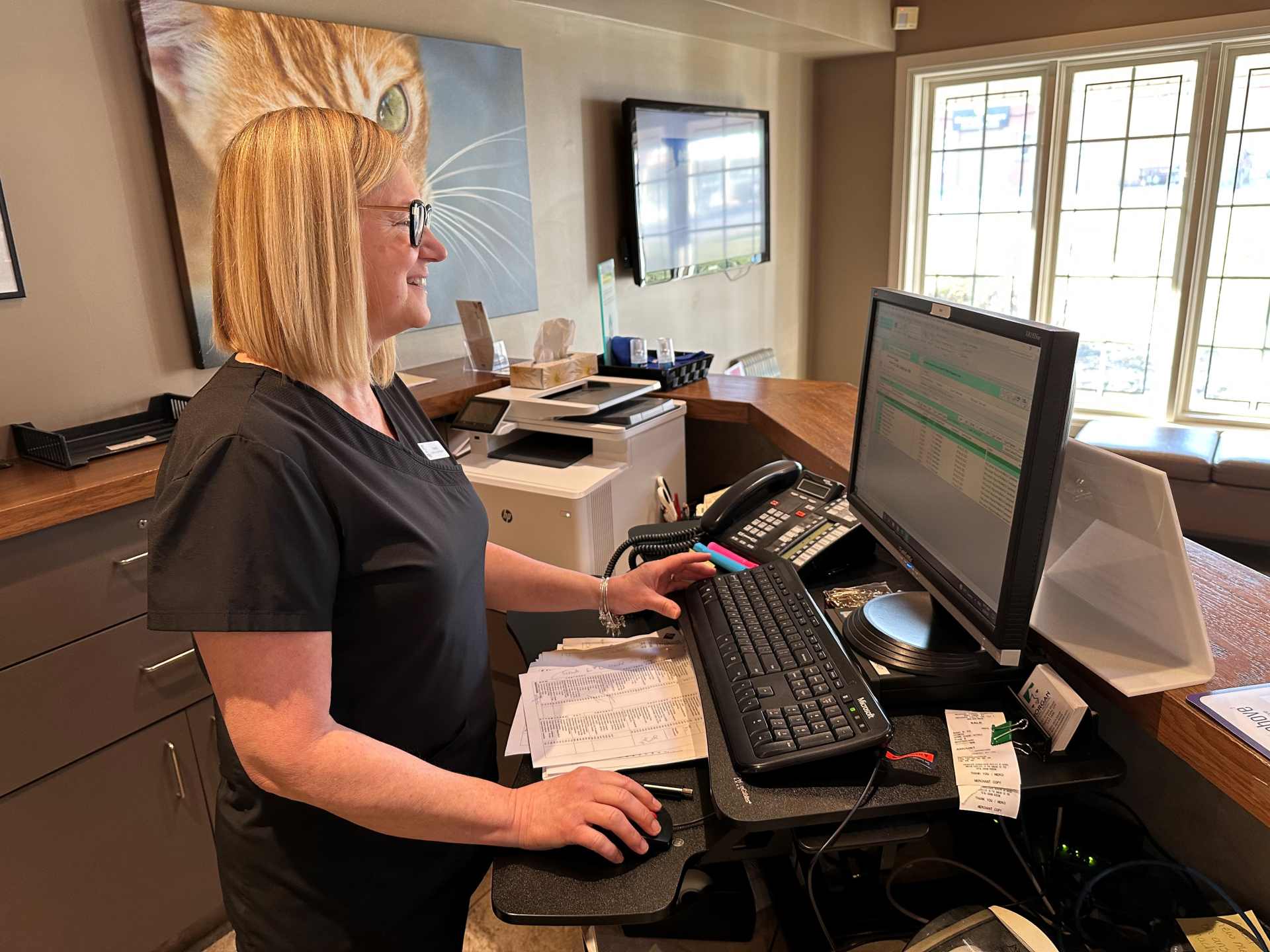 Staff standing at reception desk