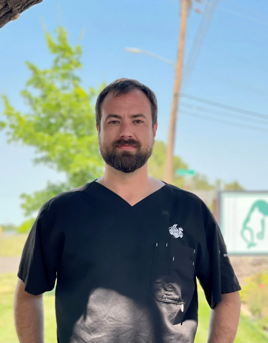 Zachary standing with 2 dogs. Zachary standing with 2 dogs.