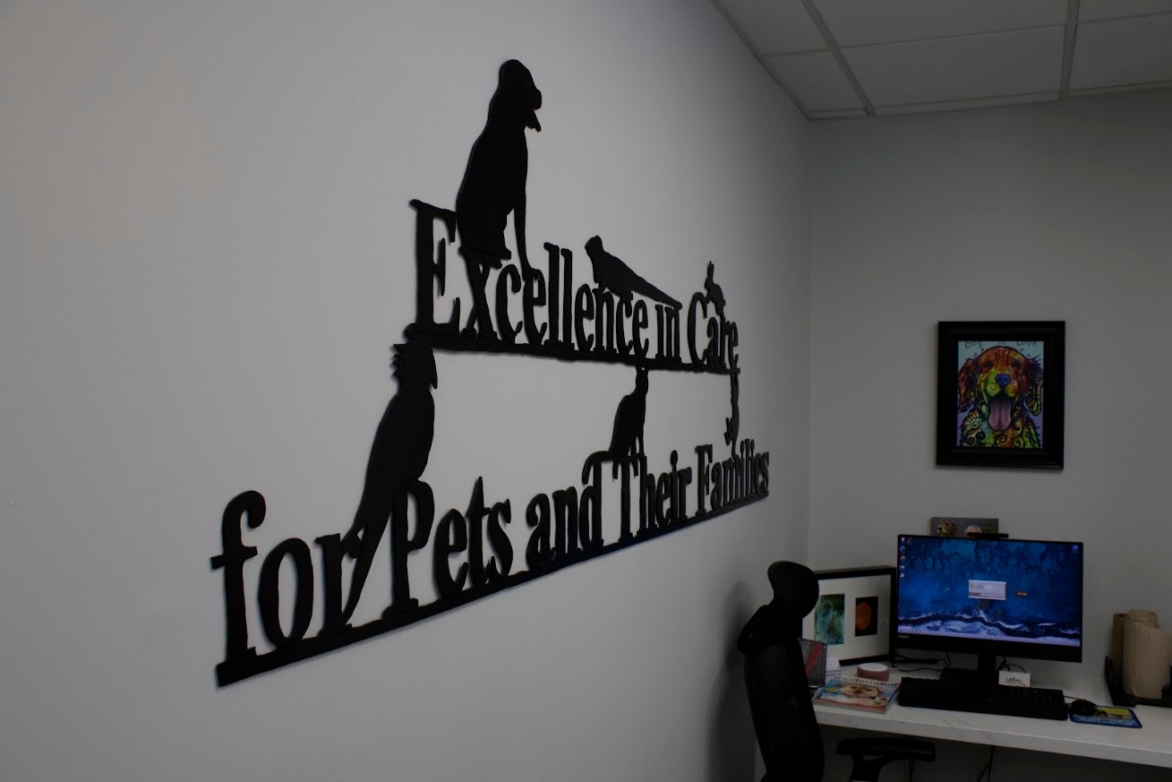 Signage on the wall of the veterinary office.