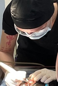 Dental scaling being performed on a patient