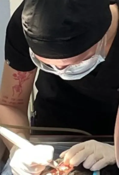 Dental scaling being performed on a patient Dental scaling being performed on a patient