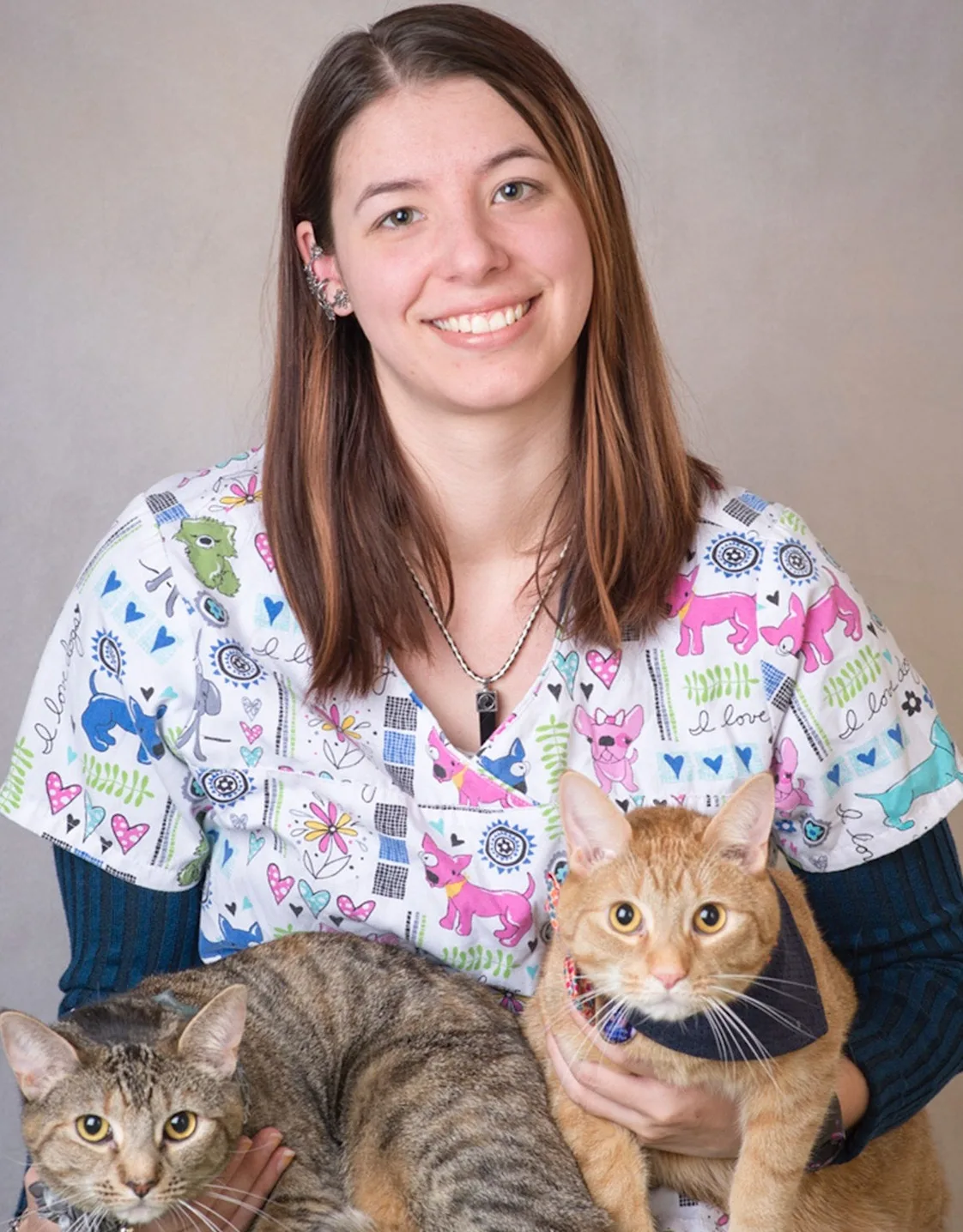 Brianna holding 2 cats Brianna holding 2 cats
