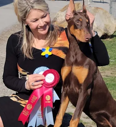 Sheryl from Three Islands Veterinary Services, with three dogs Sheryl from Three Islands Veterinary Services, with three dogs