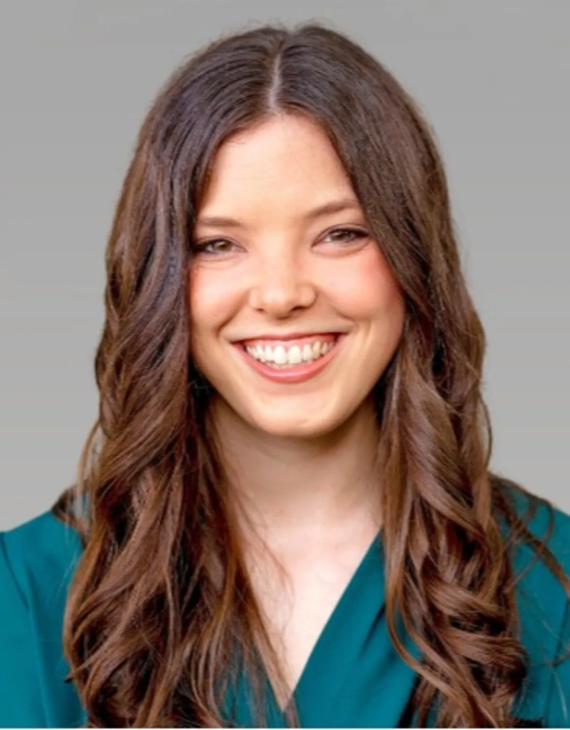 Dr. Bunde in front of a gray background Dr. Bunde in front of a gray background