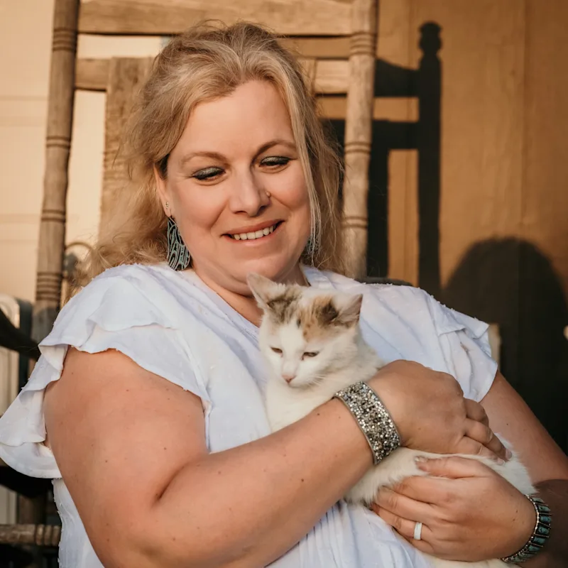 Conny holding a dog Conny holding a dog
