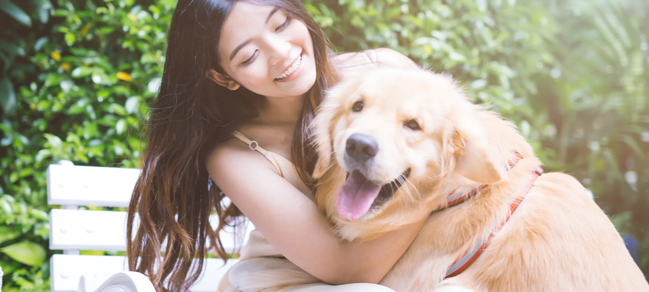 Woman with Dog on Bench