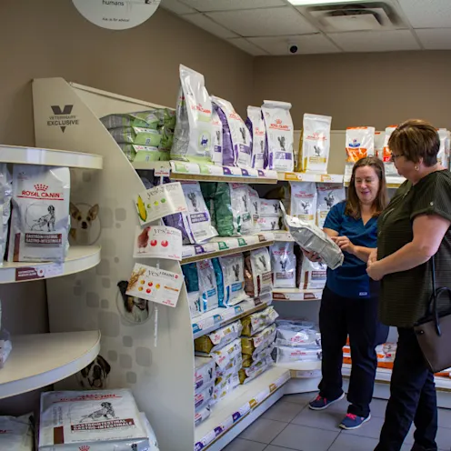Staff member helping a customer in our hospital store Staff member helping a customer in our hospital store