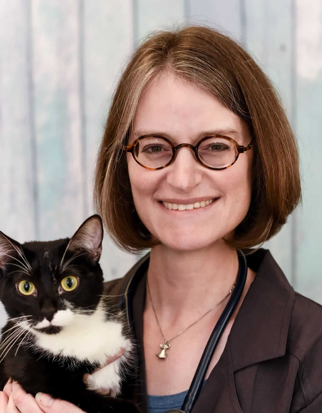 Dr. Shannon Long holding a cat Dr. Shannon Long holding a cat