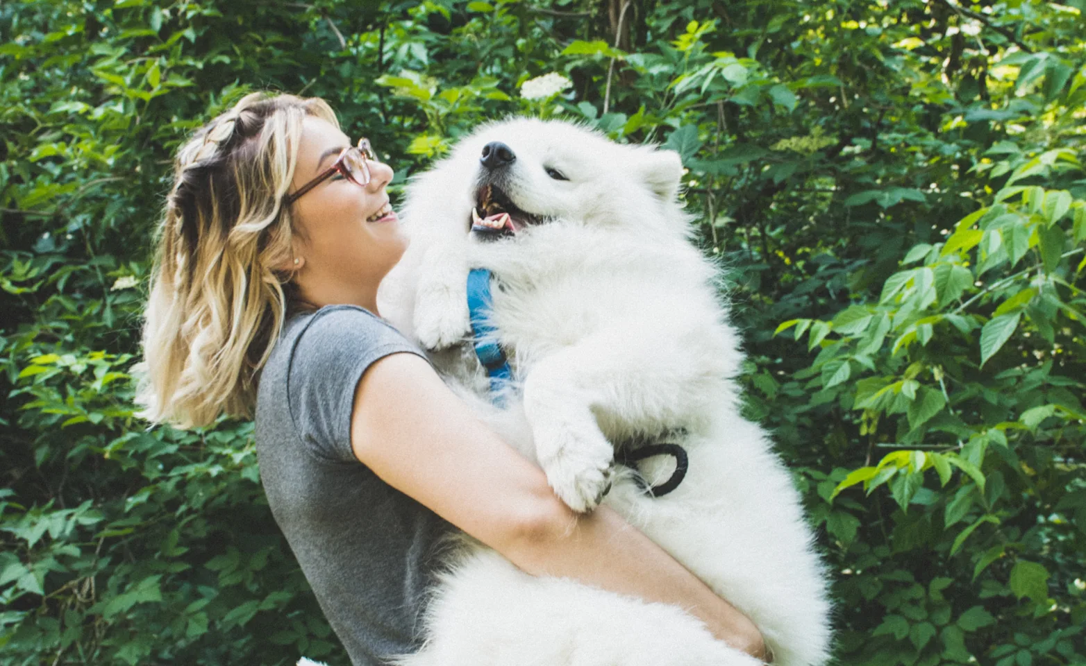 woman carry her dog