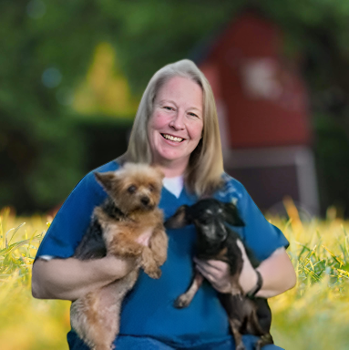 Diana Stulsky holding 2 dogs