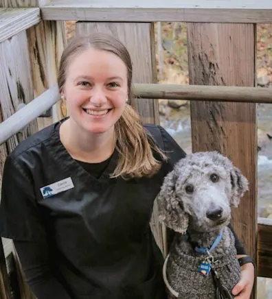 Cierra Favreau with a gray dog Cierra Favreau with a gray dog