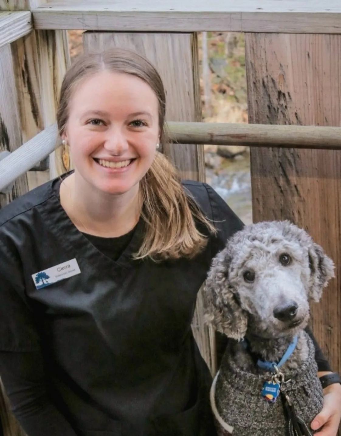Cierra Favreau with a gray dog Cierra Favreau with a gray dog