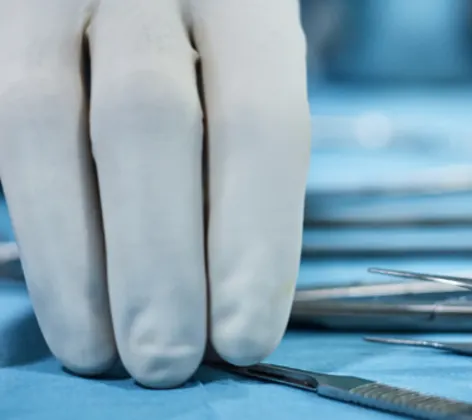 A neurosurgeon picking out tools A neurosurgeon picking out tools